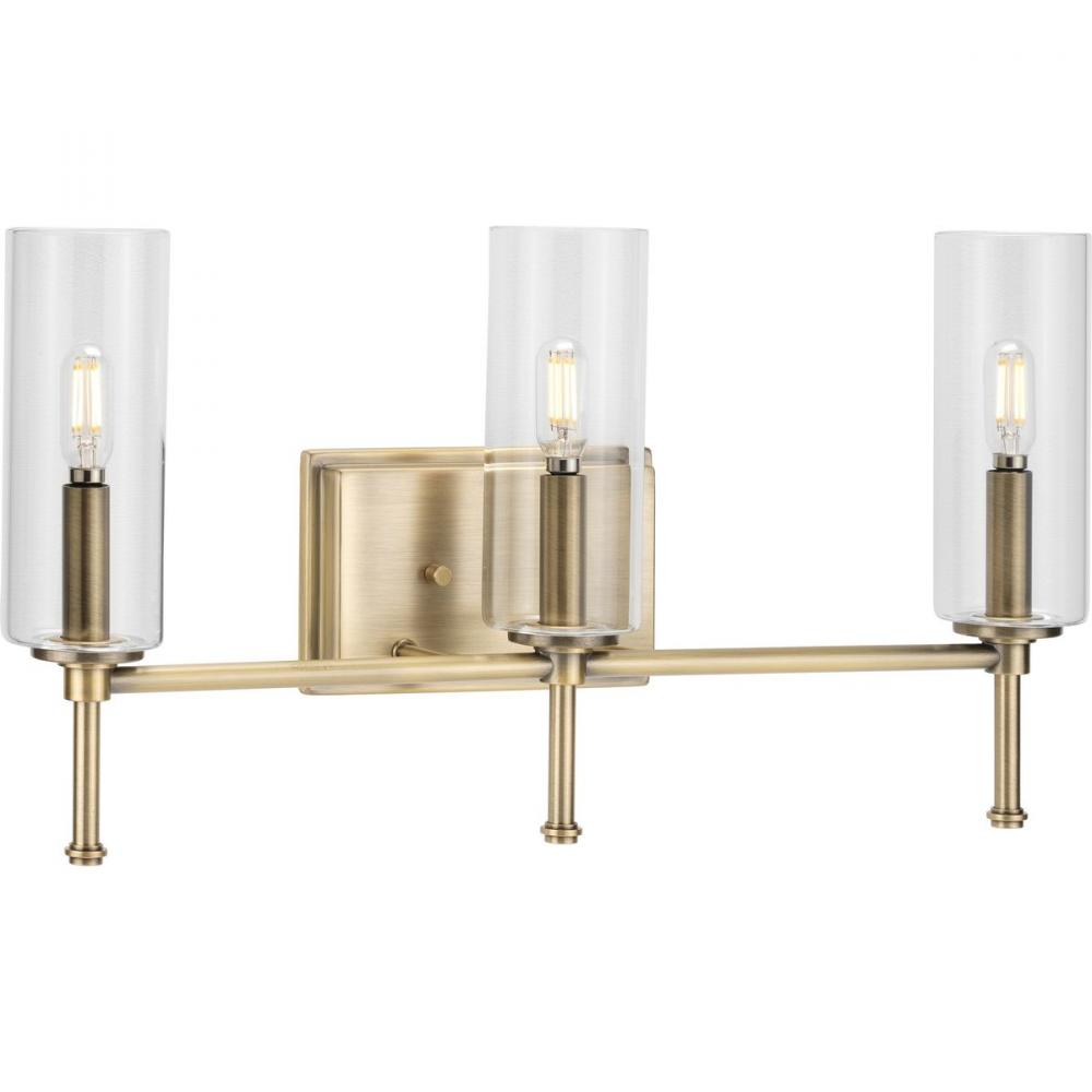 Elara Collection Three-Light Vintage Brass Clear Glass New Traditional Bath Vanity Light