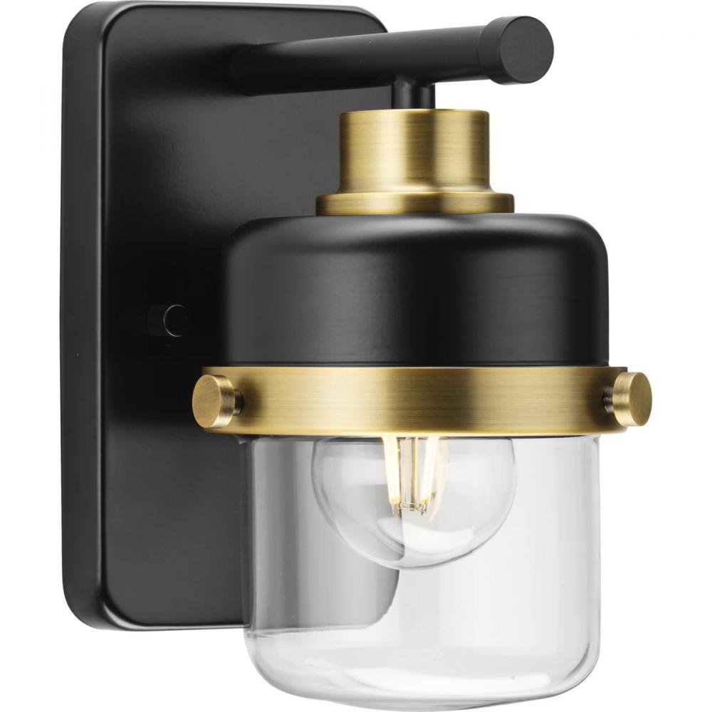 Beckner Collection One-Light Matte Black Clear Glass Urban Industrial Bath Light with Vintage Brass